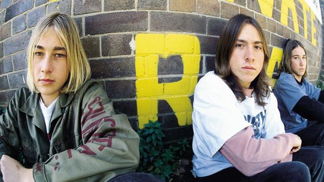 An iconic early 90s shot of Daniel, Ben and Chris by famed rock photographer Tony Mott. Picture: Supplied.