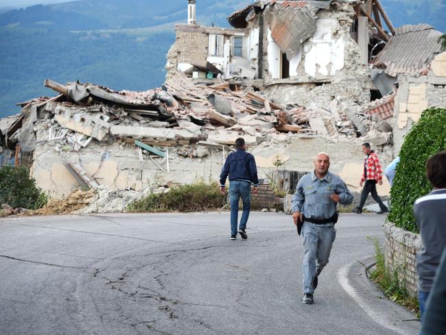 The Italian Prime Minister has cancelled an official trip and promised heavy duty machinery is on the way to help with the recovery. Picture: Filippo Monteforte.