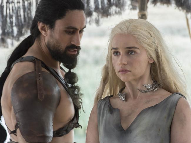 Emilia Clarke in one of the less steamy scenes on <i>Game of Thrones.</i>