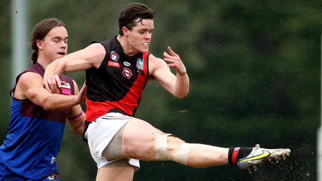 Daniel Horsfield gets a kick for Eltham. Picture: Hamish Blair