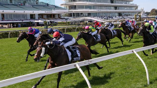 Twilight Payment ridden by Jye McNeil charging to victory in the 2020 Melbourne Cup. Picture: George Salpigtidis