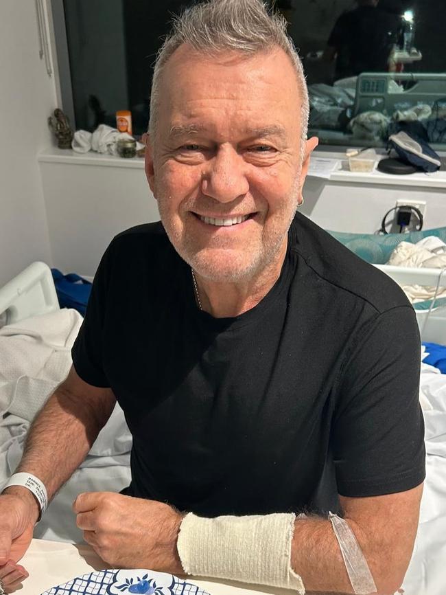 After his hip surgery, Jimmy Barnes is seen recovery in hospital.