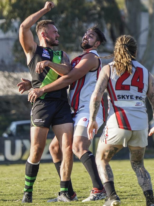 SFL: Doveton and Skye players clash. Picture: Valeriu Campan