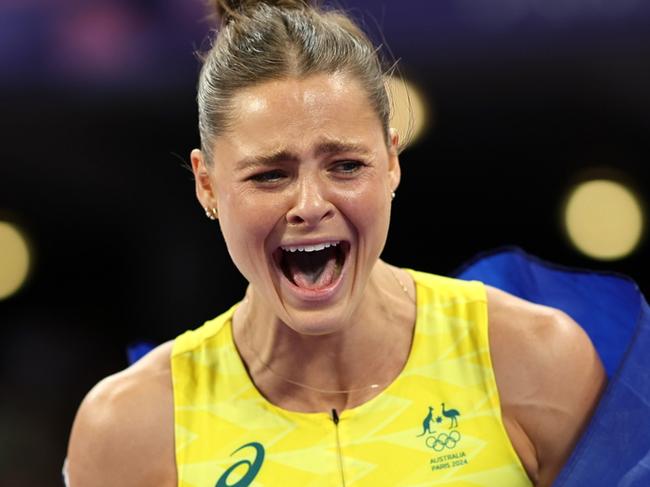 PARIS, FRANCE - AUGUST 07: Gold medalist Nina Kennedy of Team Australia reacts after winning in the Women's Pole Vault Final on day twelve of the Olympic Games Paris 2024 at Stade de France on August 07, 2024 in Paris, France. (Photo by Cameron Spencer/Getty Images)