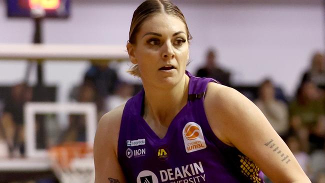 Cayla George of the Boomers handles the ball during the round 13 WNBL match between Melbourne Boomers and Bendigo Spirit at Melbourne Sports Stadium. (Photo by Kelly Defina/Getty Images)