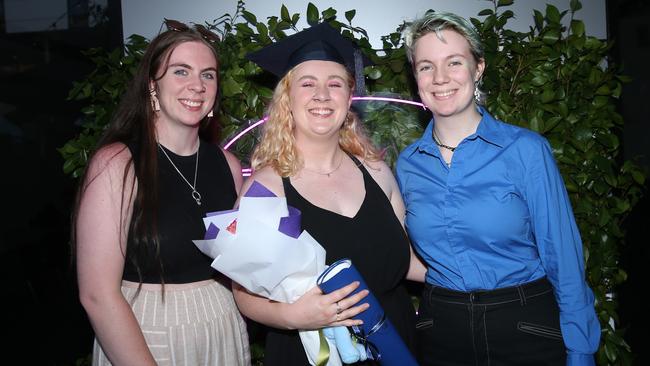 Hannah, Brigette and Finn Jennings celebrate graduation. Picture: Alan Barber