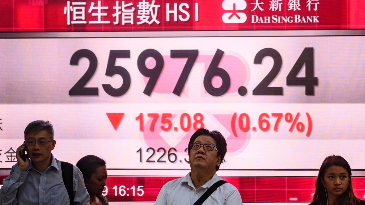 Devaluing its currency caused global markets to tailspin. Picture: Philip Fong/AFP