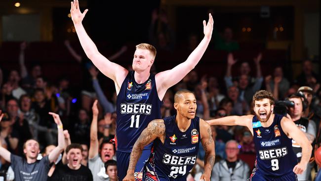 Harry Froling celebrates a three-pointer with the crowd on Friday night. Picture: Mark Brake (Getty).