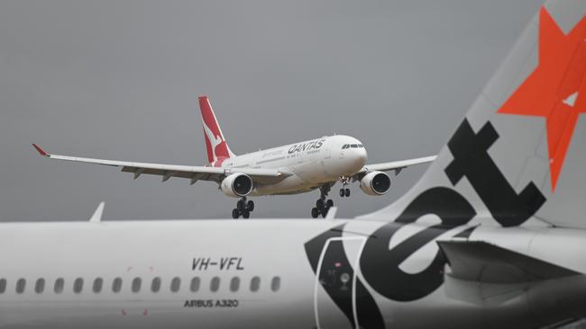 The vaccination mandate issued by Qantas and Jetstar is the subject of a class action by two dozen employees. Picture: Naomi Jellicoe