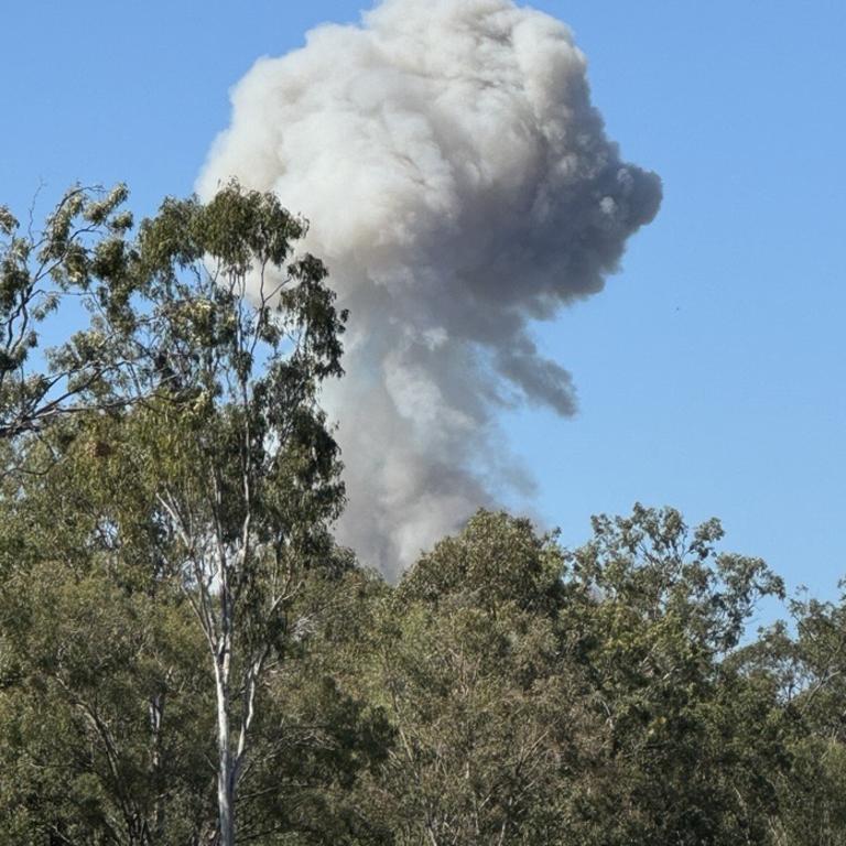 Smoke after the collision between a ute and a truck carrying ammonium nitrate. Picture: Queensland Police