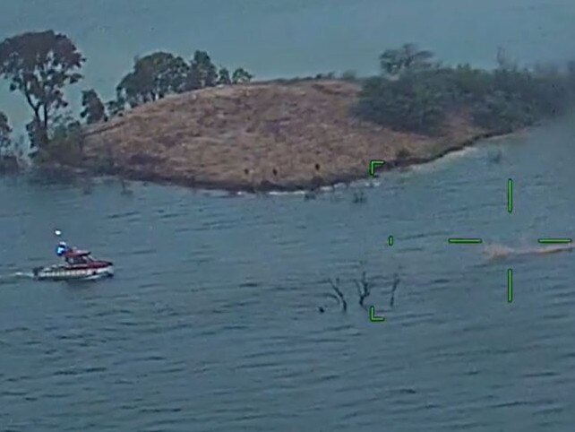 Police vision of the rescue at Lake Eildon after a boat capsized. Picture: Victoria Police