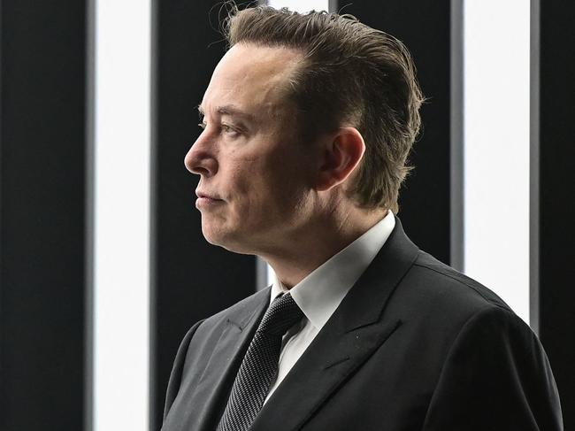 (FILES) In this file photo taken on March 22, 2022 Tesla CEO Elon Musk is pictured as he attends the start of the production at Tesla's "Gigafactory" in Gruenheide, southeast of Berlin. - Billionaire Elon Musk will address Twitter employees at a meeting this week, the company confirmed June 14, 2022, in a first since launching his troubled $44 billion bid for the social media platform. (Photo by Patrick Pleul / POOL / AFP)