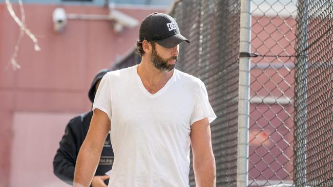 Former Australian Olympic swimmer Grant Hackett leaving Southport Watchhouse. (Pic: Jerad Williams)