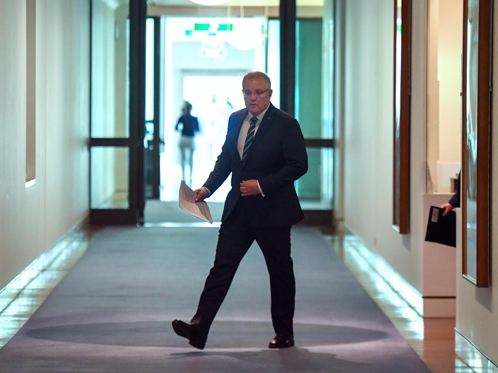 Prime Minister Scott Morrison arriving at a media conference to announce a large-scale, state-based cyber attack targeting Australian government and business. Picture: AAP