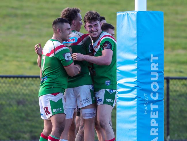 Zac Williams and South Eastern halfback Cooper Steven celebrate another try. Picture: Adam Wrightson Photography