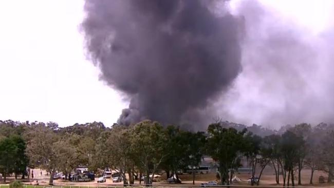 The Great Western races have been cancelled after a car fire sent smoke billowing into the sky.