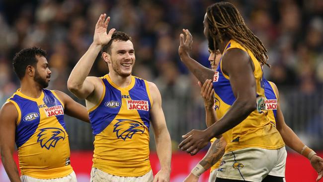 Luke Shuey high fives Nic Naitanui during the 85-point rout. Pic: Getty Images