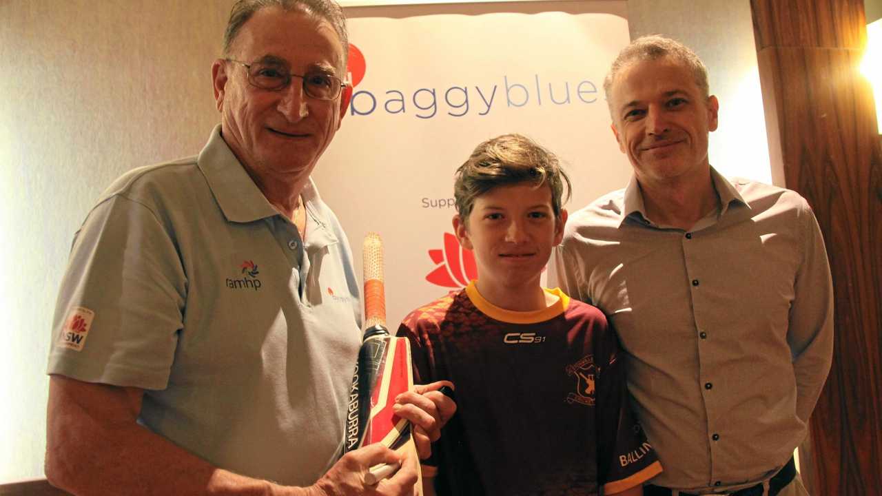 BAGGY BLUES: Former Test and World Series fast bowler Lenny Pascoe was happy to sign a bat for junior Alstonville player Sam Dayhew who attended the Baggy Blues breakfast with dad Guy. Picture: Alison Paterson