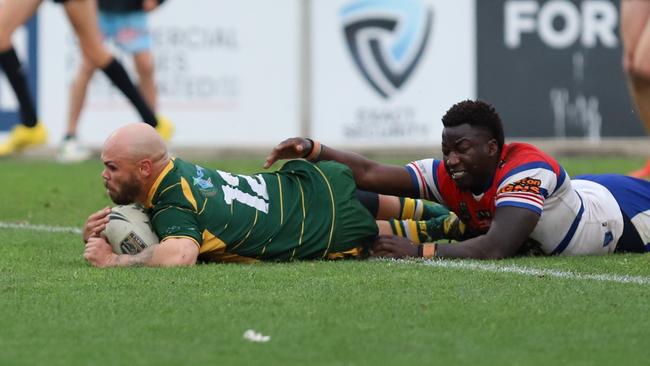 Windsor forward Aidan Ryan scores a try. Picture: Steve Montgomery