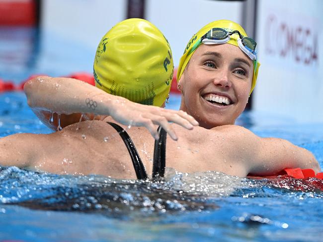 Emma McKeon, right, with compatriot Cate Campbell after the 50m race. Picture: AFP