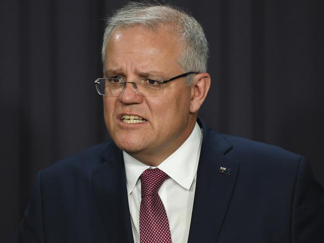 Prime Minister Scott Morrison speaks to media during a press conference at Parliament House on Tuesday where he outlines Australia’s response to coronavirus. Picture: AAP/Lukas Coch