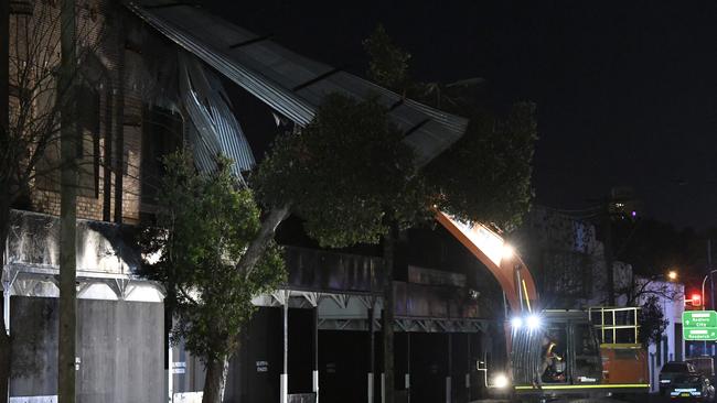 The roof of this building on Botany Rd, Alexandria was torn off last night. Picture: Gordon McComiskie