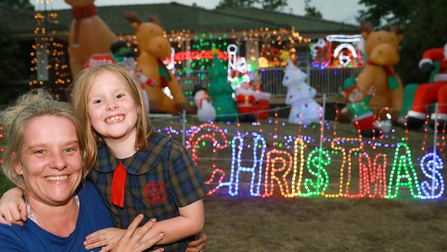 Louise Phillips and her daughter Samantha, 7, at their Watton Rd display. Picture: Angelo Velardo