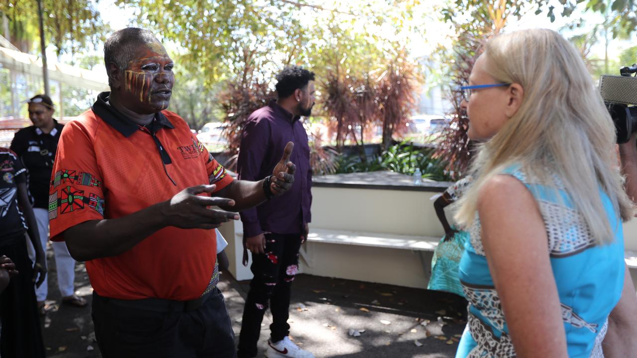 Senior Munupi man Mr Tungatulum leads family members in a performance of a Jorrigjorringa (kookaburra) song outside Darwin Local Court following the death in care coronial for 47-year-old Pukumani Alimankinni, on April 24, 2024. Picture: Zizi Averill