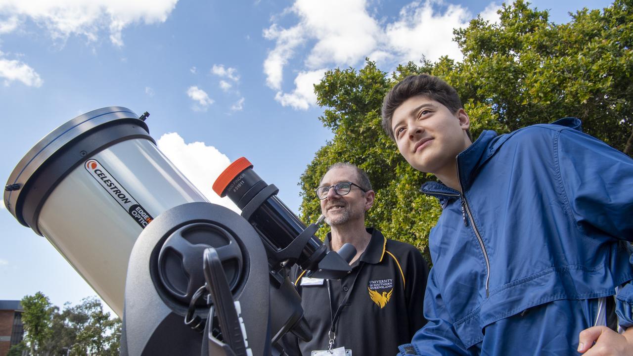 Astronomer Rodger Macqueen with Connor Weinand at the USQ open day. Sunday, August 15, 2021. Picture: Nev Madsen.