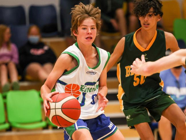 SPORT ADVSA Junior Country Basketball Championships from St Clair Recreation centre, WoodvilleCourt 1 Ã¢â¬â 16 Boys Div 1 Ã¢â¬â Riverland v Barossa ValleyRiverlands  Kieran Hahn  meanders around Barossa Valleys Mason Feltus.  IMAGE/Russell Millard