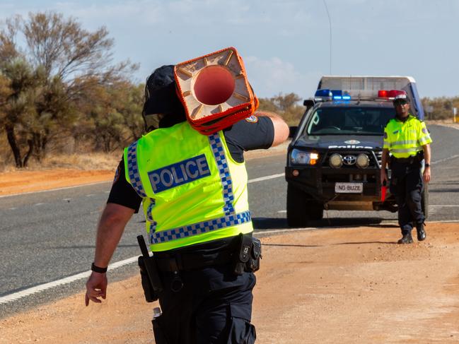 NT police prepare for the NT/SA border closure at 4pm on Tuesday. Picture: Emma Murray