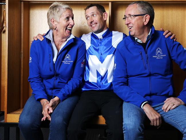 Jockey Hugh Bowman with part-owners Patty and Peter Tighe.