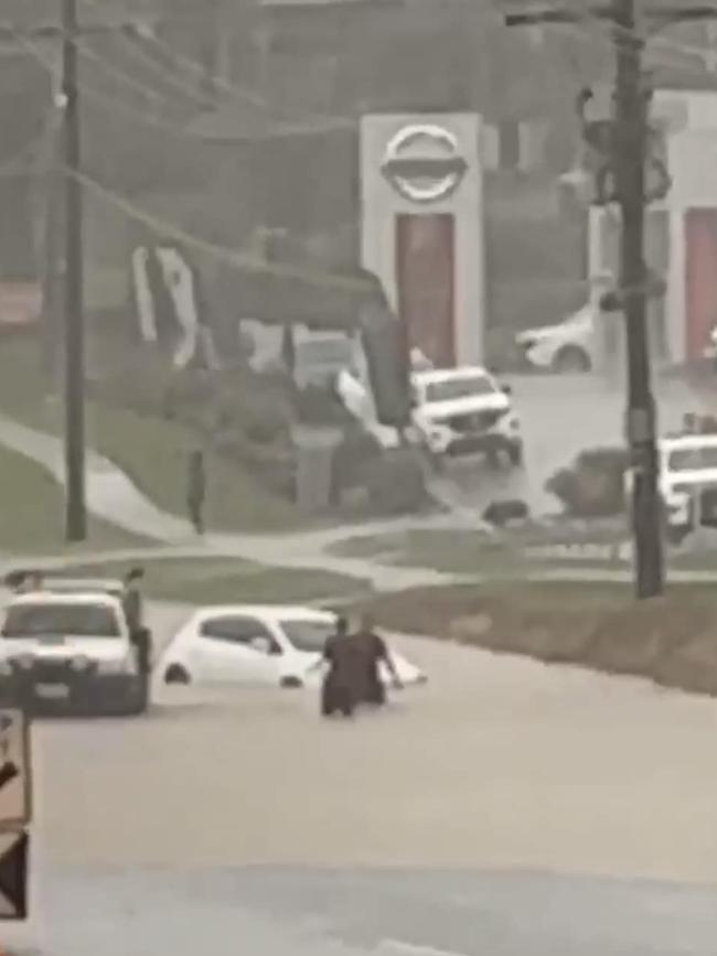 A car under water near Lilydale Toyota. Picture: Yarra Valley Rides Facebook page