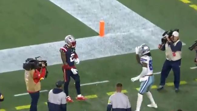 Dallas wide receiver CeeDee Lamb waves at a Patriots defender after scoring the game-winning touchdown. Picture: Twitter