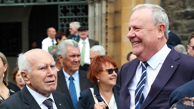 John Howard and Peter Costello at Kevin Andrews’s funeral last week. Picture: NewsWire / Ian Currie