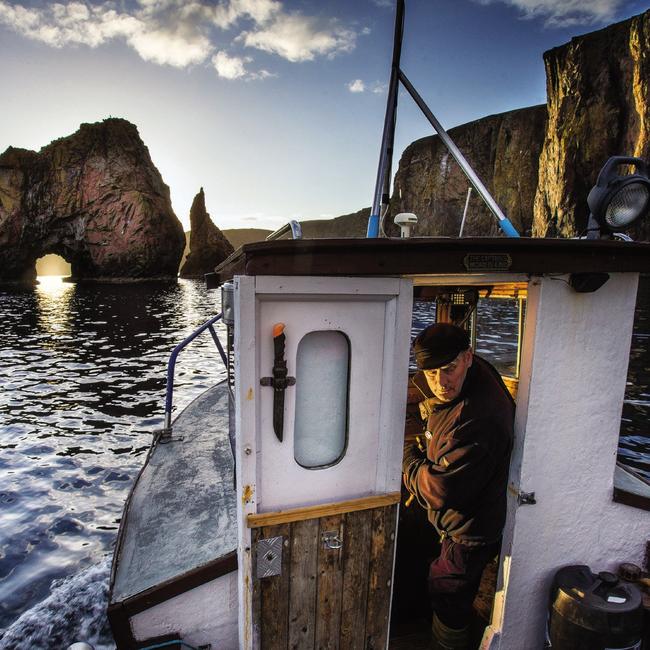 Veteran mariner Henry Anderton navigates his boat around the island of Vaila in Shetland, Scotland. Henry’s family were the historic owners of the island but he was forced to sell it in the nineties to incomers. Picture: @chamiltonjames/National Geographic