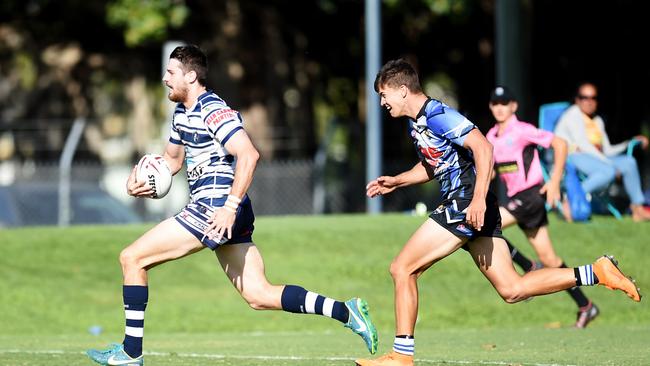 Brothers' Ty Carucci outruns Lions's James Barrie. Picture: Alix Sweeney