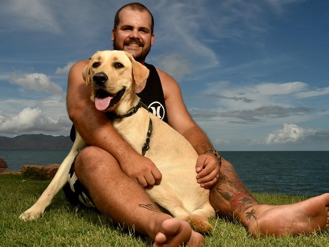 Hayden Ruddell with his Labrador Retriever Gunner – by far Australia’s most popular dog breed. Picture: Evan Morgan