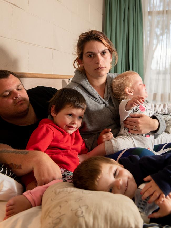 Tarnie Edwards with husband Robbie and children Sienna, 3, Isabella, 2, and Sandra, 1, at their temporary accommodation in Doveton. Picture: Penny Stephens