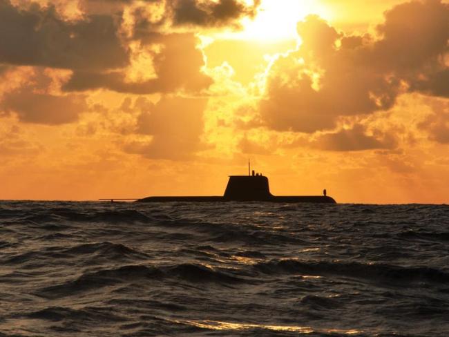 The Royal Australian Navy Collins Class Submarine HMAS Sheean at sunset during a routine transit and training exercise off Christmas Island.