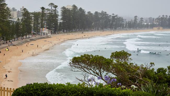 The quiet scene at the Northern Beaches’ Manly Beach on Saturday. Picture: Getty Images