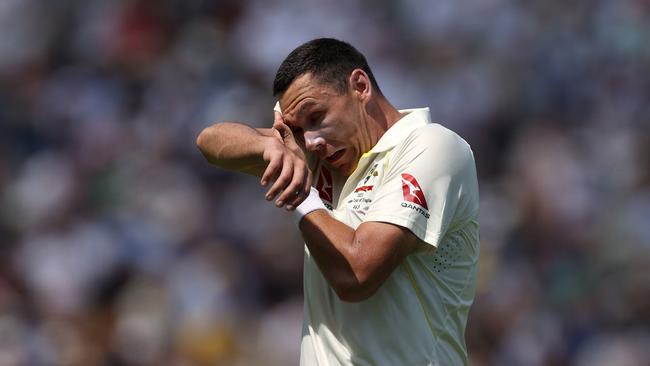 Scott Boland has endured a tough day out against England. Picture: Getty