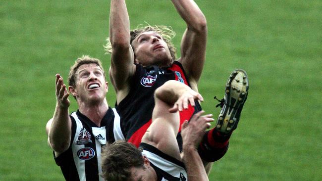 James Hird takes a mark in the last quarter. 2005 Anzac Day match. Essendon v Collingwood. MCG.