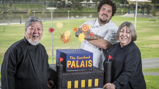 Chefs Cheong Liew, Duncan Welgemoed and Cath Kerry with a cake inspired by Adelaide’s Floating Palais. Pic: Mike Burton