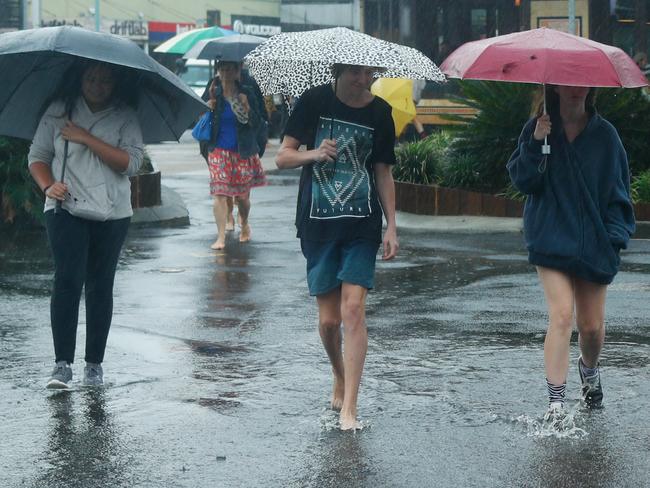 Flooded streets are seen in Byron Bay, Northern NSW, Sunday, February 9, 2020. A severe weather warning for very heavy rain, damaging winds, abnormally high tides and damaging surf is in place on Sunday morning for the entire NSW coast. (AAP Image/Danielle Smith) NO ARCHIVING