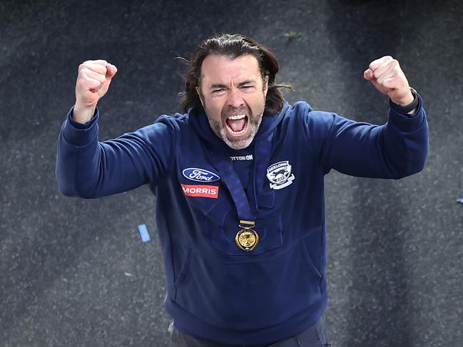 2022 AFL Grand Final between the Geelong Cats and Sydney Swans at the MCG. Geelong Cats coach Chris Scott celebrates to the crowd as he walks down the race.                    Picture: David Caird