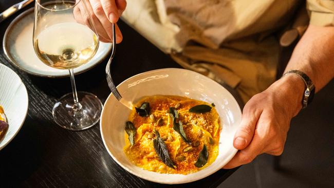 Chicken ravioli and pumpkin veloute.