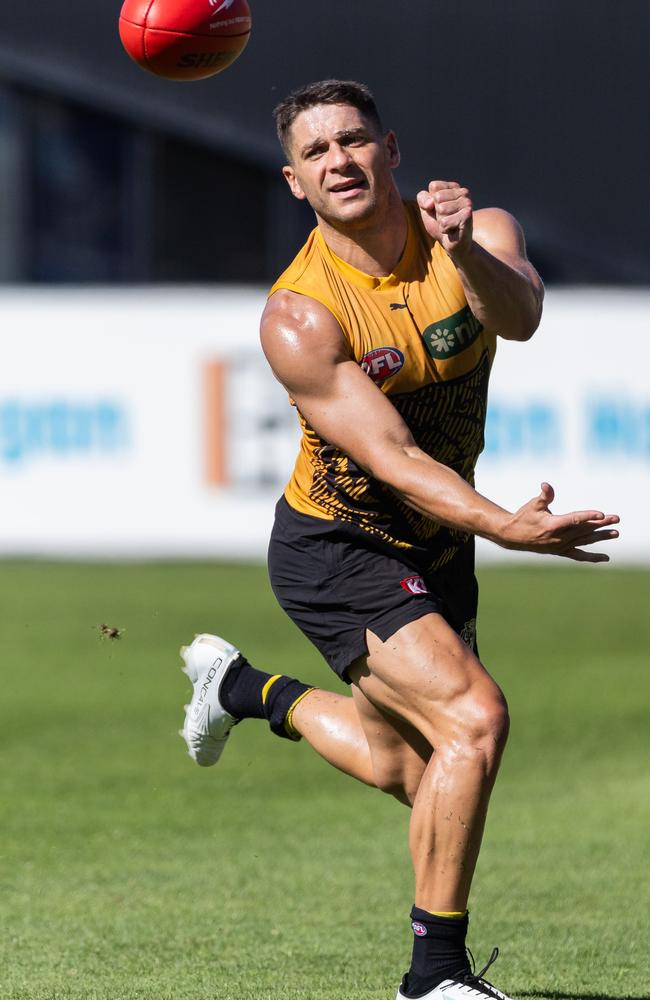 Dion Prestia fires a handball. Picture: Jason Edwards