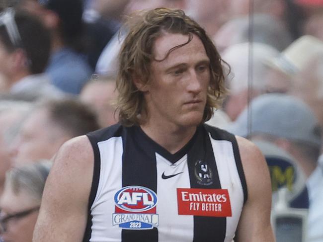 MELBOURNE, AUSTRALIA - SEPTEMBER 30: Nathan Murphy of the Magpies reacts on the bench after leaving the field for tests after a contest during the 2023 AFL Grand Final match between Collingwood Magpies and Brisbane Lions at Melbourne Cricket Ground, on September 30, 2023, in Melbourne, Australia. (Photo by Daniel Pockett/AFL Photos/via Getty Images)