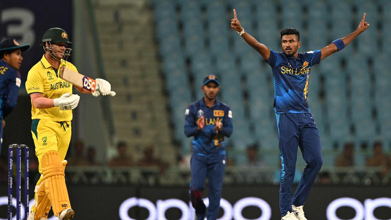 David Warner reviews his LBW decision against Sri Lanka. Picture: Arun Sankar / AFP